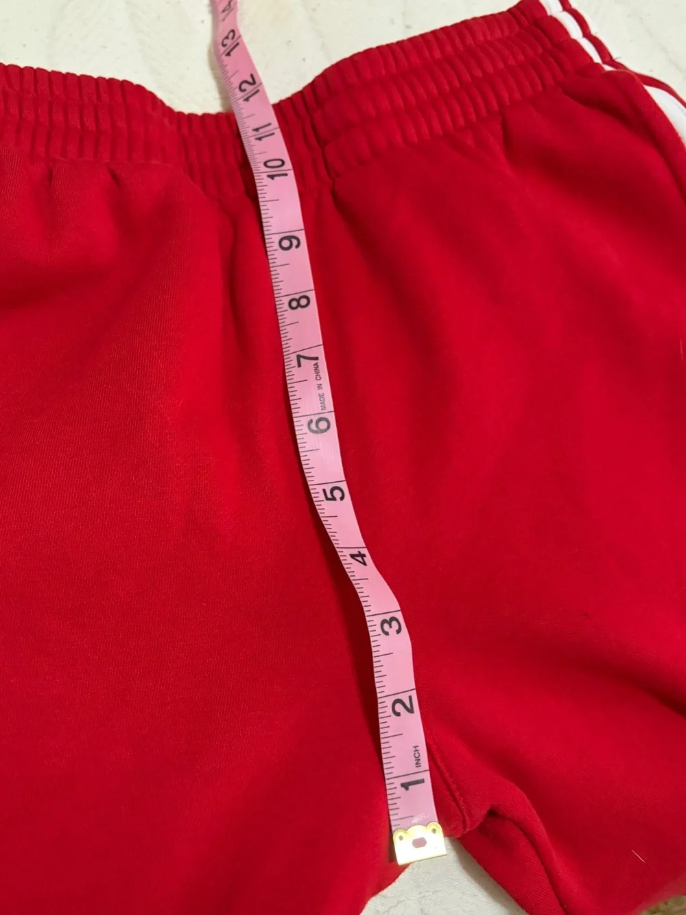 adidas Red size 14/16 Joggers with White Side Stripes. Like new! Soft. Sporty.